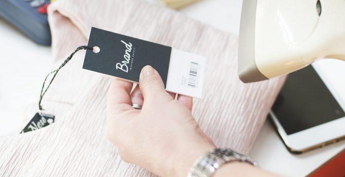 Barcode scanner is scanning the price tag